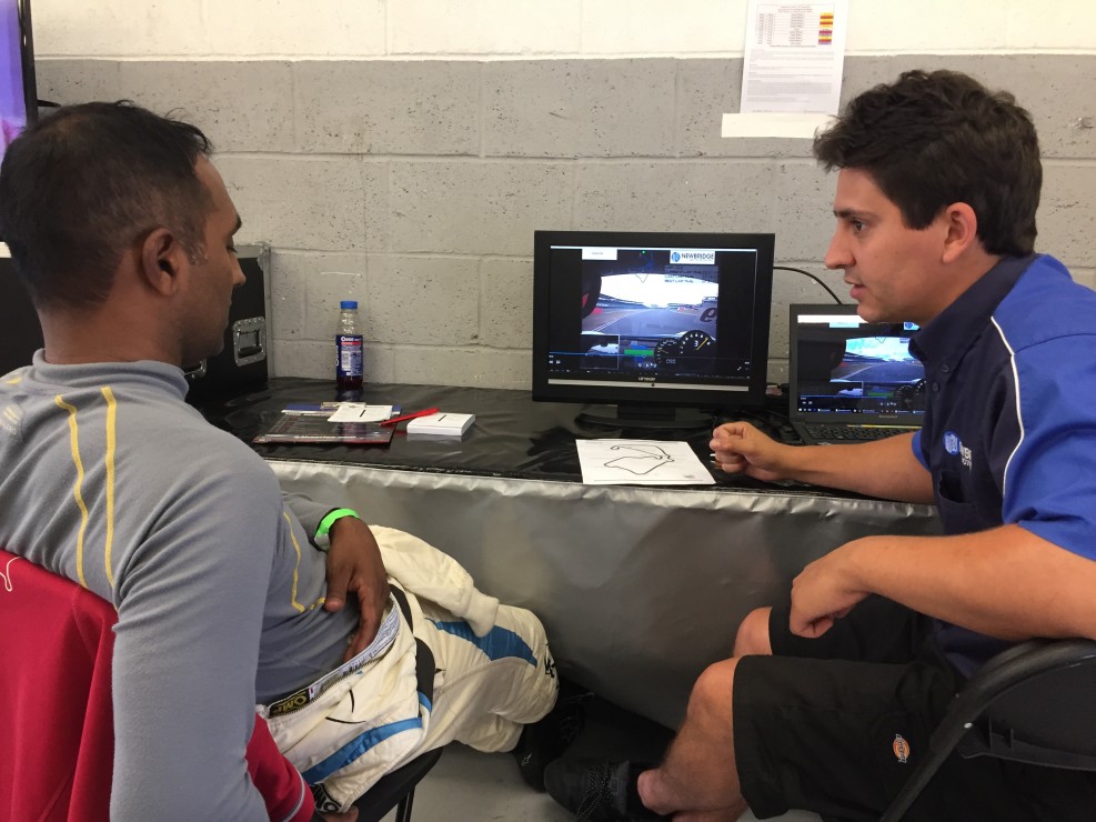 Fareed with Marcus looking at his data from Friday testing