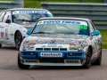 With Andy Pritchard in hot persuit at the Tarzan hairpin. Photo © Dave Maries.