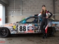 Michelle posing with the 924 we'll be driving in the 4Pot Trophy
